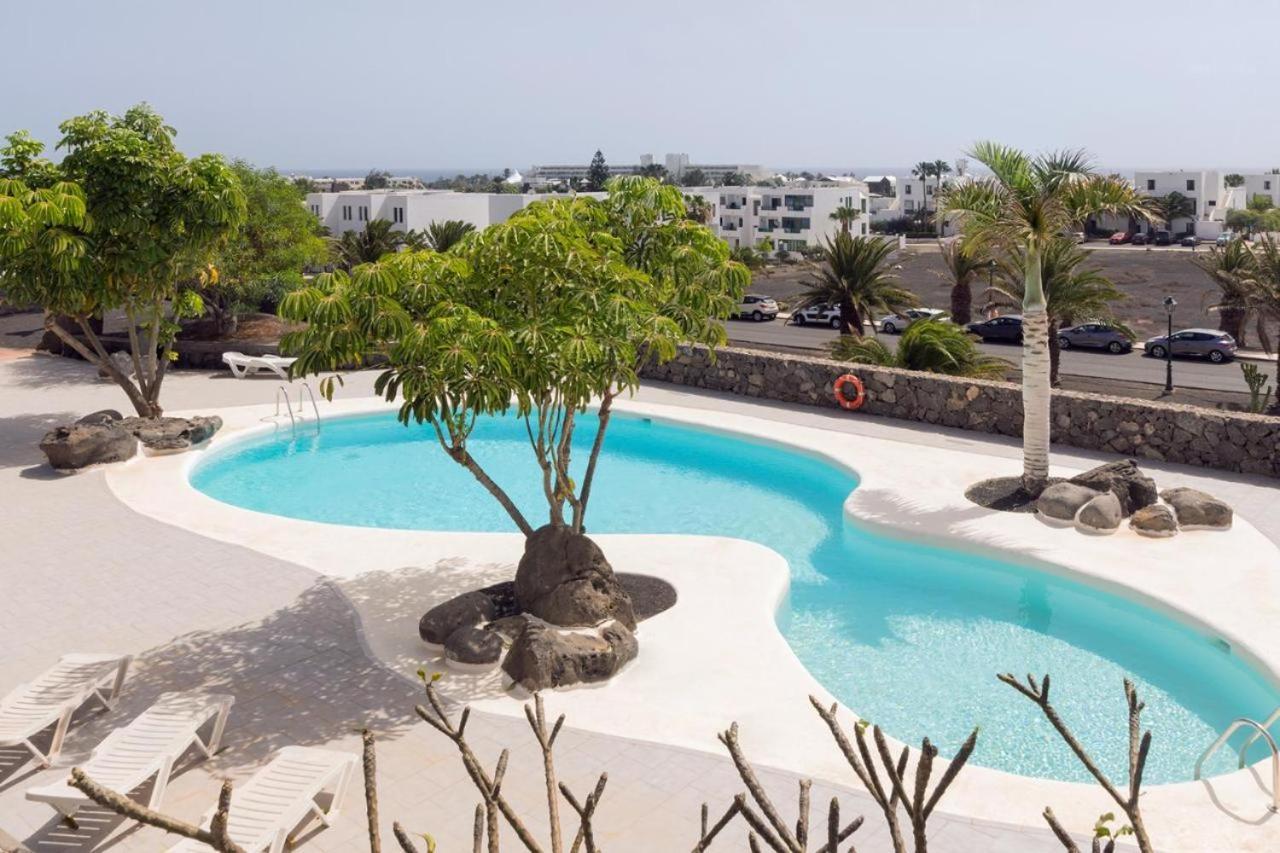 Apartamento Om Con Piscina Y Vistas Al Mar Daire Costa Teguise Dış mekan fotoğraf